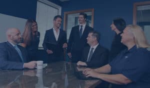 image of judd shaw and team in a meeting